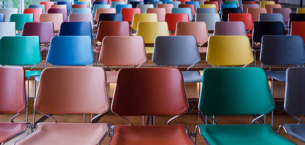 Rows of colorful chairs in Auditorium
